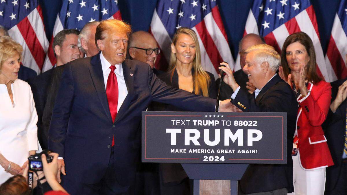 Donald Trump introduces U.S. Senator Lindsey Graham to a crowd gathered at the South Carolina State Fairgrounds on Saturday, Feb. 24, 2024. Trump was declared the winner of the South Carolina primary.