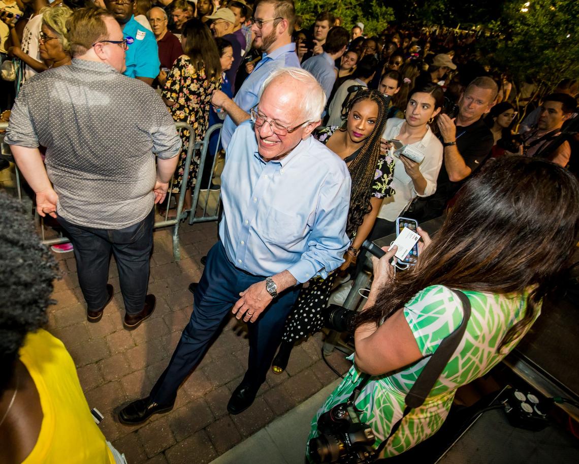 Sen. Bernie Sanders enters Jim Clyburnâ€™s World Famous Fish Fry at Edventure, featuring twenty one Democratic presidential candidates.