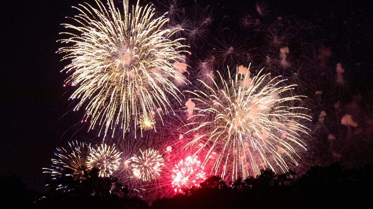 Fireworks are visible from Dreher Shoals Dam at Lake Murray on Saturday, July 4, 2020. While the park is open for people to view the Independence Day fireworks, bathrooms are still closed to help stop the spread of the coronavirus.