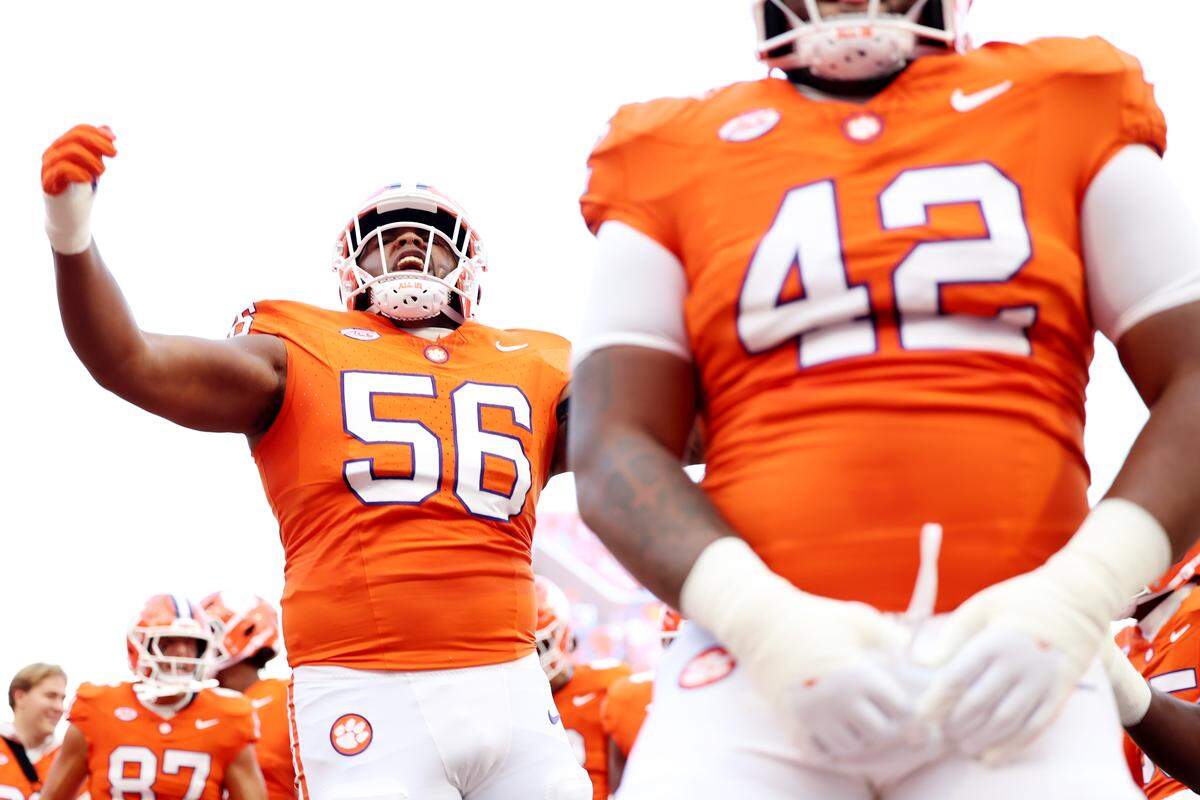 CLEMSON, SOUTH CAROLINA - AUGUST 30: Defensive tackle Champ Thompson #56 of the Clemson Tigers yells in excitement before the game against the LSU Tigers at Memorial Stadium on August 30, 2025 in Clemson, South Carolina.