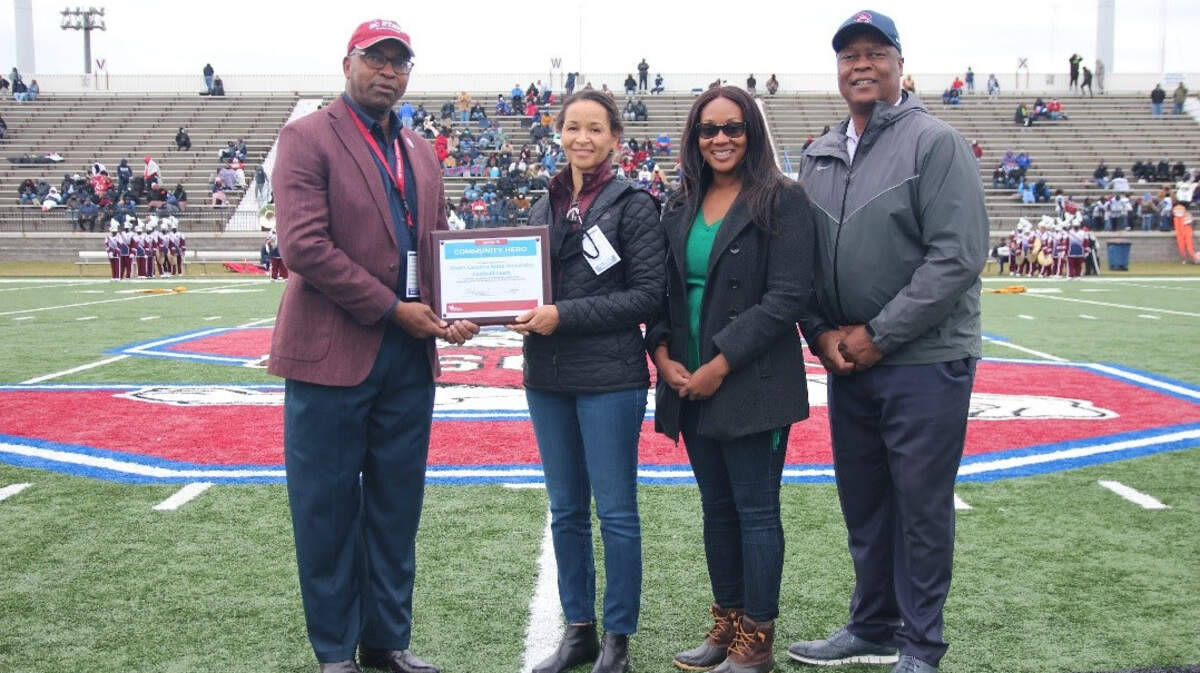 From left to right: Col. Alexander Conyers, SC State’s interim president; Dr. Linda Bell, state epidemiologist; Felicia Veasey, DHEC COVID response operations director for the Lowcountry; and SC State Athletics Director Stacy Danley during DHEC’s award presentation.