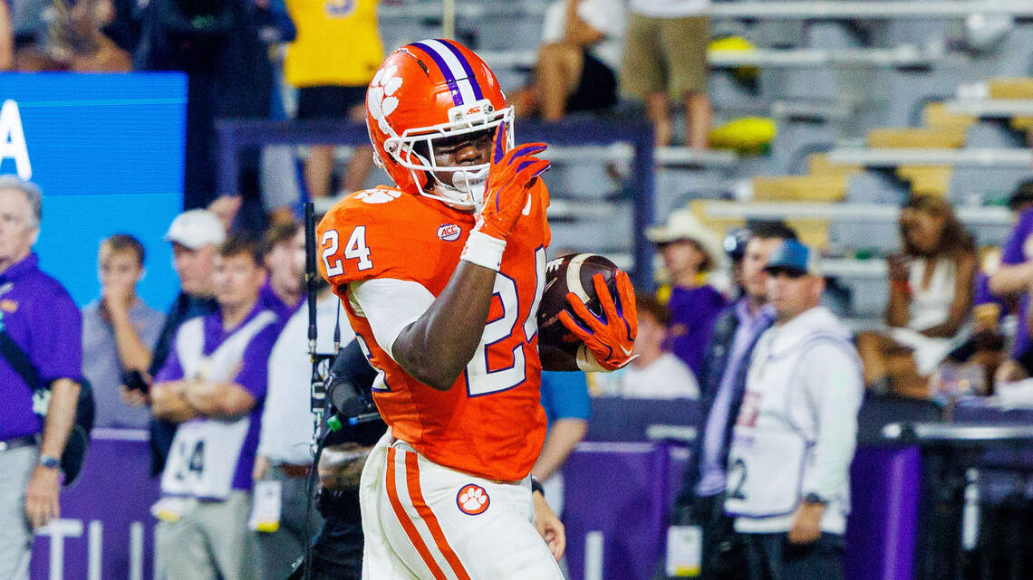 Clemson running back carted off field with injury. The latest on his status