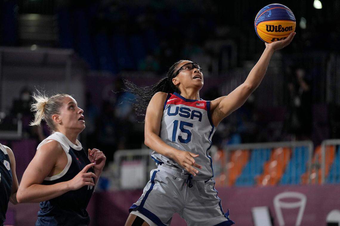 United States’ Allisha Gray (15) heads to the basket past Evgeniia Frolkina (16), of the Russian Olympic Committee, during a women’s 3-on-3 gold medal basketball game at the 2020 Summer Olympics, Wednesday, July 28, 2021, in Tokyo, Japan. (AP Photo/Jeff Roberson)