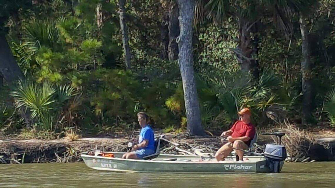 Vibrio is a sometimes lethal organism that lives in brackish creeks of the Carolina coast. This photo shows two fishermen at Edisto Beach in 2017. The man in the front of the boat died from a vibrio infection after being pricked by an infected crab.