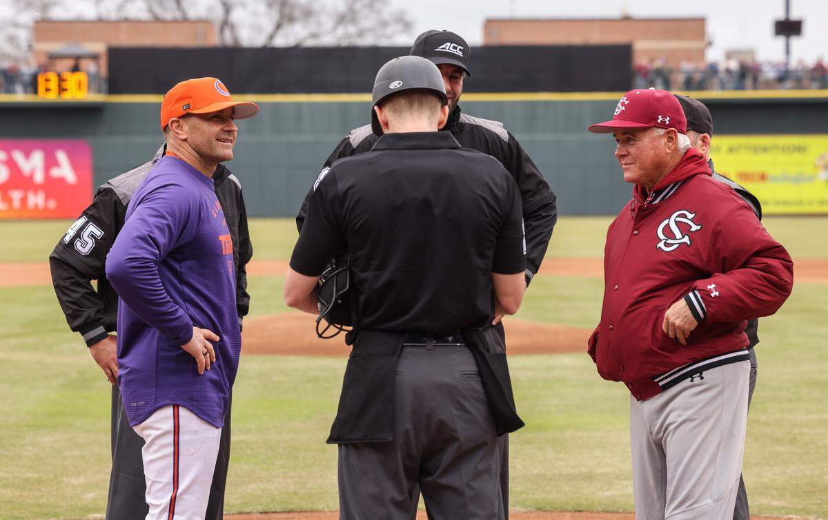 Clemson head coach Erik Bakich and South Carolina head coach Paul Mainieri meet with officials prior to South Carolina’s game against Clemson at Segra Park in Columbia on Saturday, February 28, 2026.