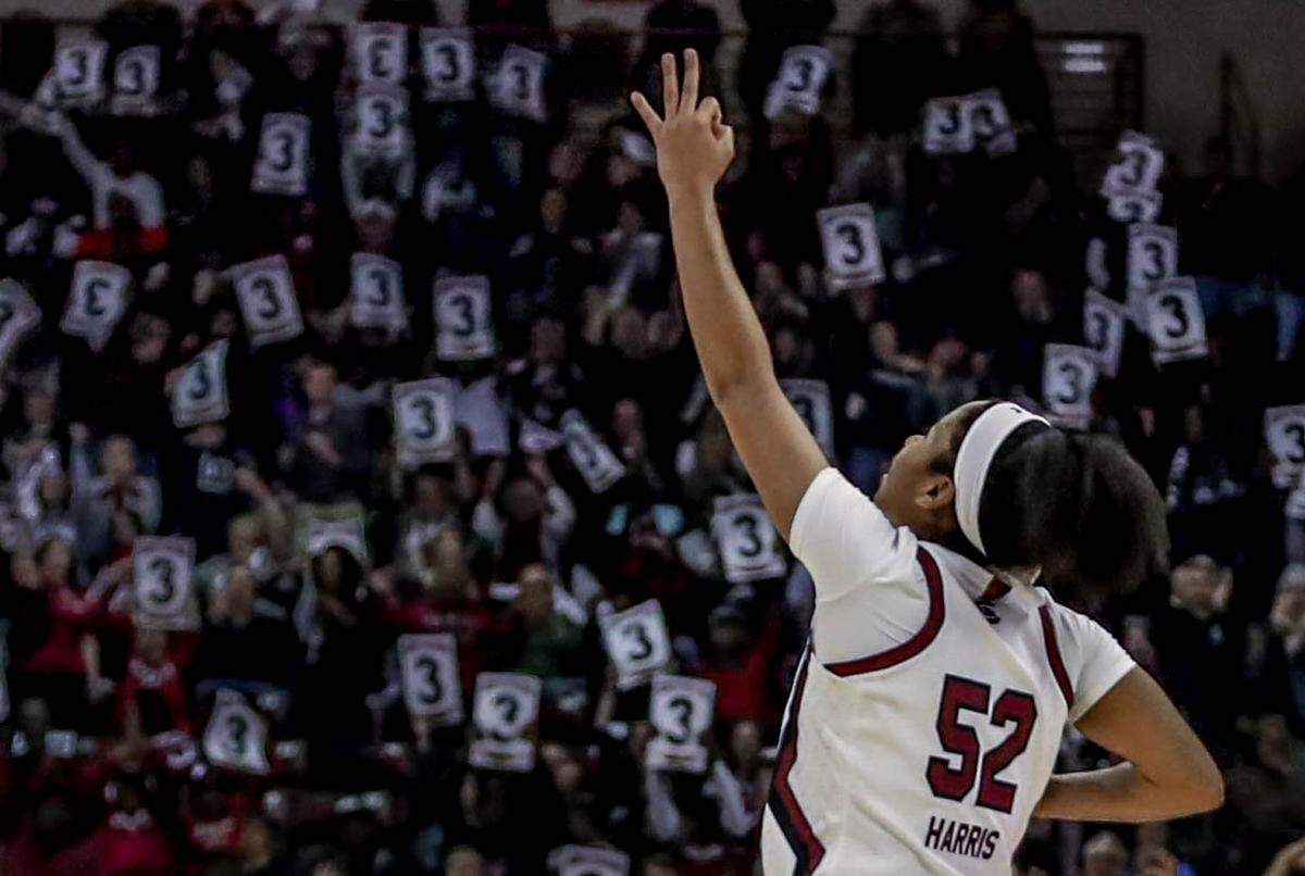 South Carolina’s Tyasha Harris (52) celebrates a three-pointer with the fans during the first half of action against Mississippi State in the Colonial Life Arena.
