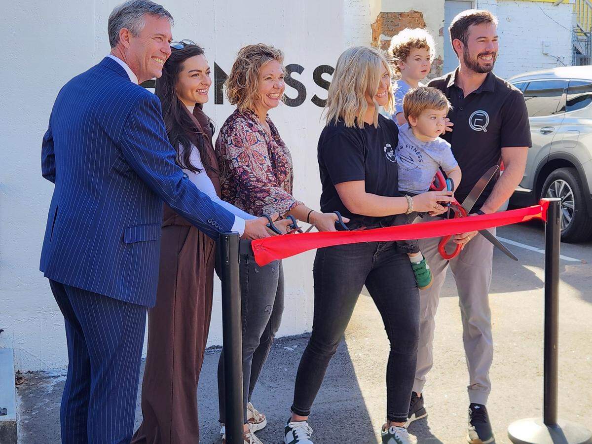 Columbia Mayor Daniel Rickenmann, left, joins officials from EQ Fitness and Physical Therapy on Nov. 12, 2024 as the business marked its grand opening at 1815 Gervais St.