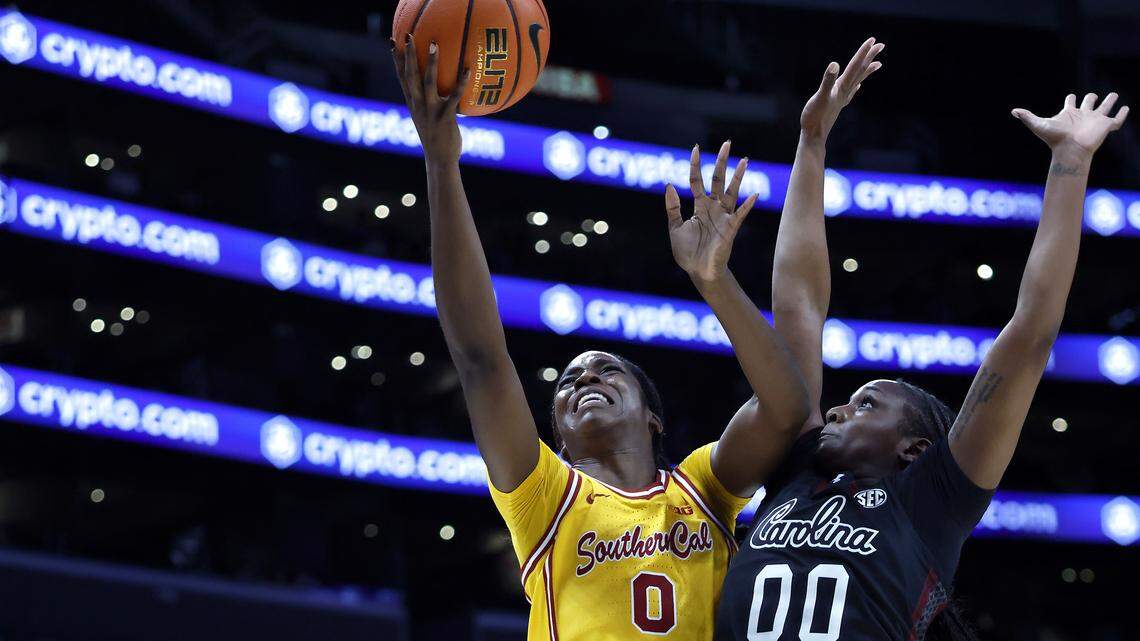 Vivian Iwuchukwu #0 of the USC Trojans takes a shot against Ta'Niya Latson #00 of the South Carolina Gamecocks during the first half at Crypto.com Arena on November 15, 2025 in Los Angeles, California. 