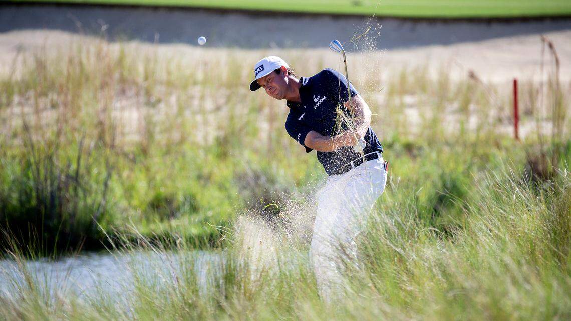 Harris English hits out of the bunker on the 18th green during the 2021 Palmetto Championship at Congaree Golf Club. The PGA Tour returns to Congaree this week for the CJ Cup.
