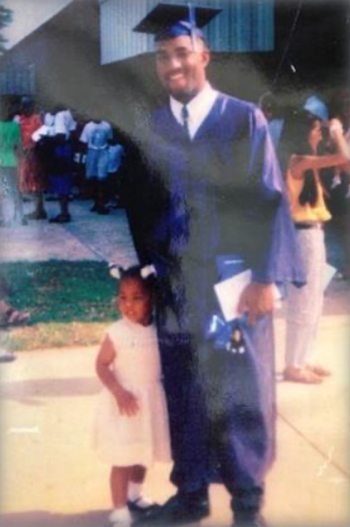 Wilveria Sanders hugging her brother Shelton Sanders at his 1993 high school graduation in Sumter, SC.