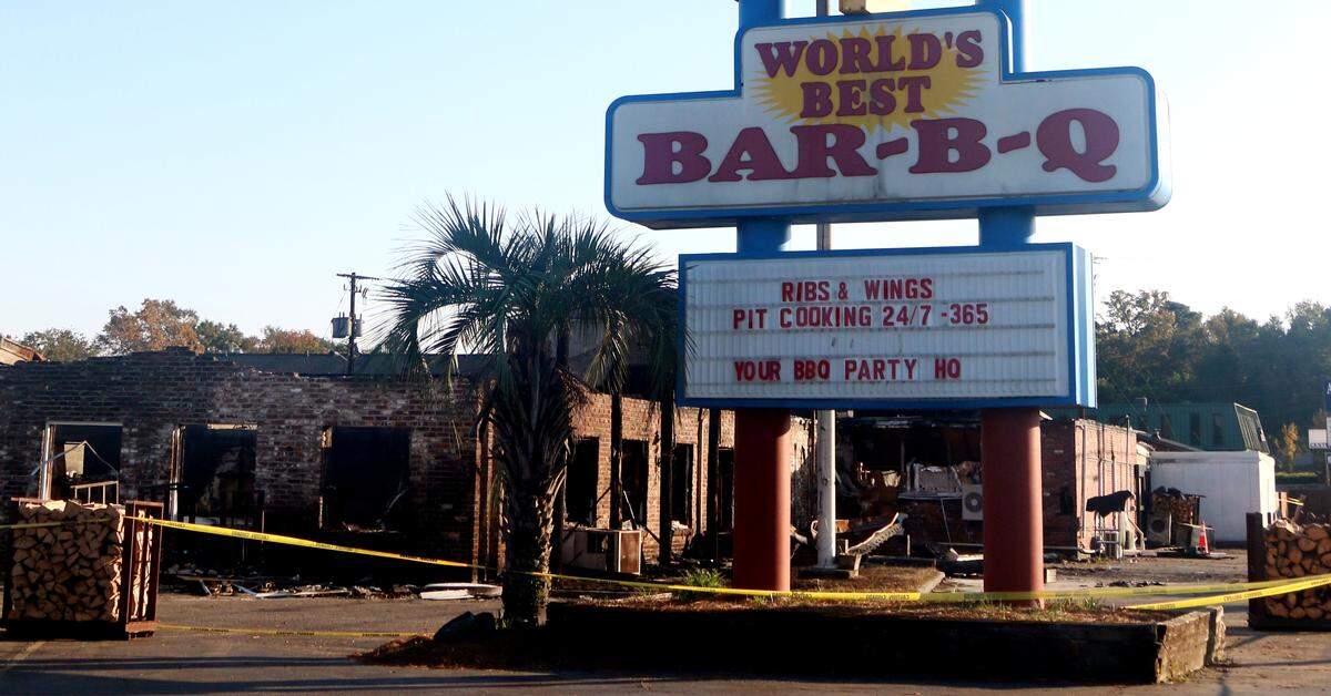 Two days after its cooking facility was destroyed in a fire, the sign at Maurice’s Piggie Park BBQ in West Columbia still touted its around-the-clock barbecue operation.
