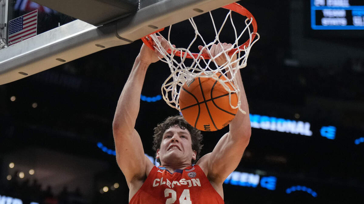 Mar 28, 2024; Los Angeles, CA, USA; Clemson Tigers center PJ Hall (24) shoots against the Arizona Wildcats in the second half in the semifinals of the West Regional of the 2024 NCAA Tournament at Crypto.com Arena.