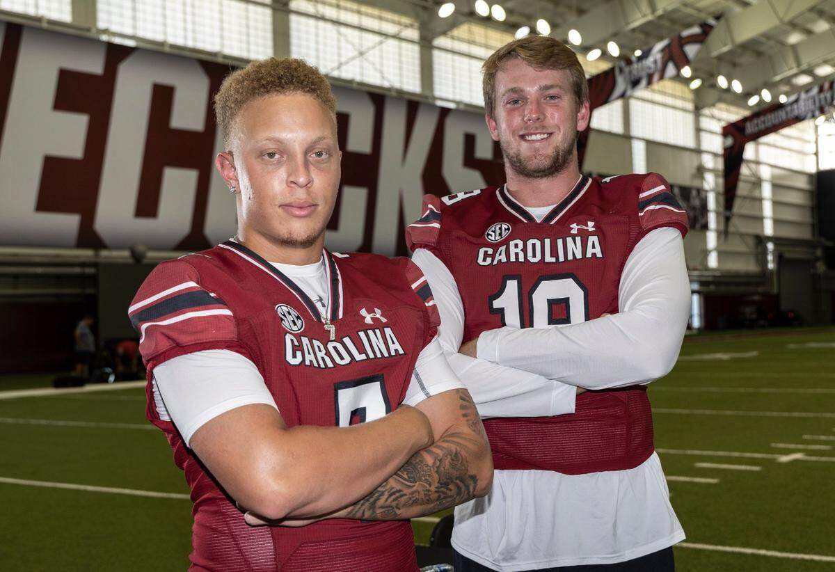 Spencer Rattler (7) and Justin Stogner (18) during team media day on Thursday, Aug. 4, 2022 in the Jerri and Steve Spurrier Indoor Practice Facility.