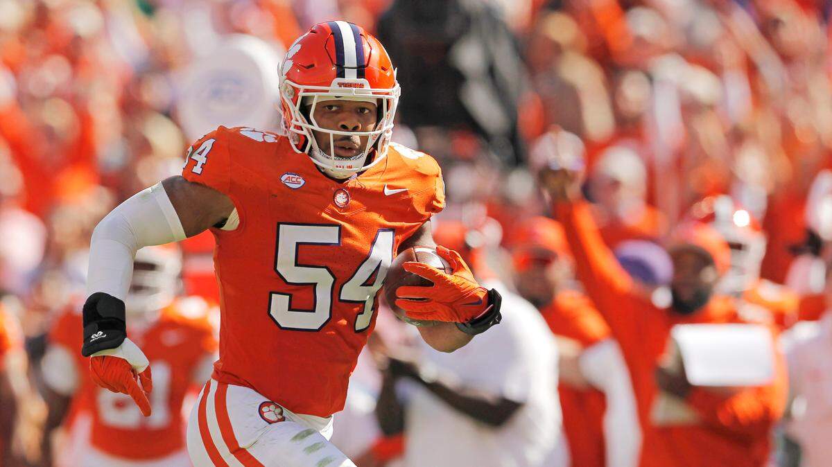 Clemson linebacker Jeremiah Trotter Jr. (54) puts a pick six on the box score against Notre Dame during first-half action in Clemson, S.C. on Saturday, Nov. 4, 2023. (Travis Bell/SIDELINE CAROLINA)