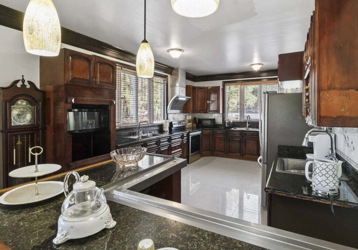 The house on Griffin Mill Court is traditional outside, Asian inside.