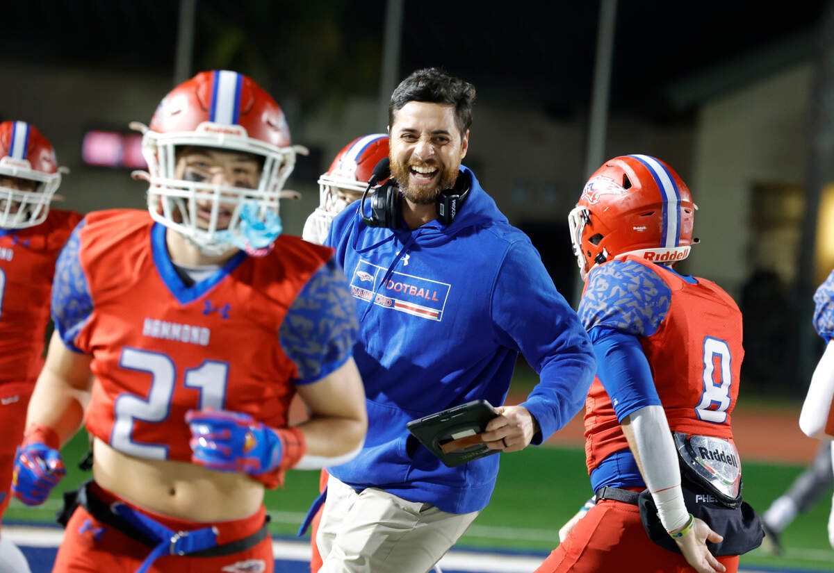Hammond head football coach Jon Wheeler and players celebrate a touchdown as Hammond faced Laurence Manning in the SCISA Class 4A football championship on Friday, Nov. 18, 2022, at Charleston Southern University.