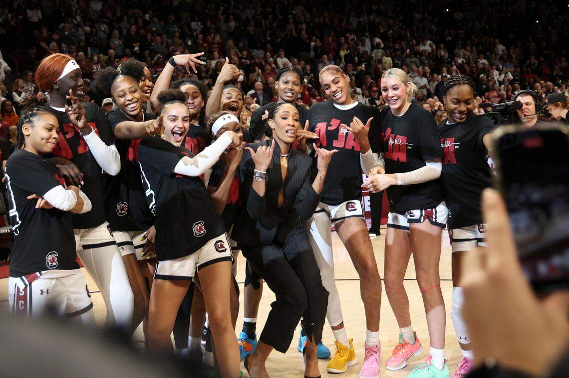 A’ja Wilson celebrates with the Gamecocks women’s basketball team after a ceremony to retire her jersey and hang it in the Colonial Life Arena on Sunday, Feb. 2, 2025.