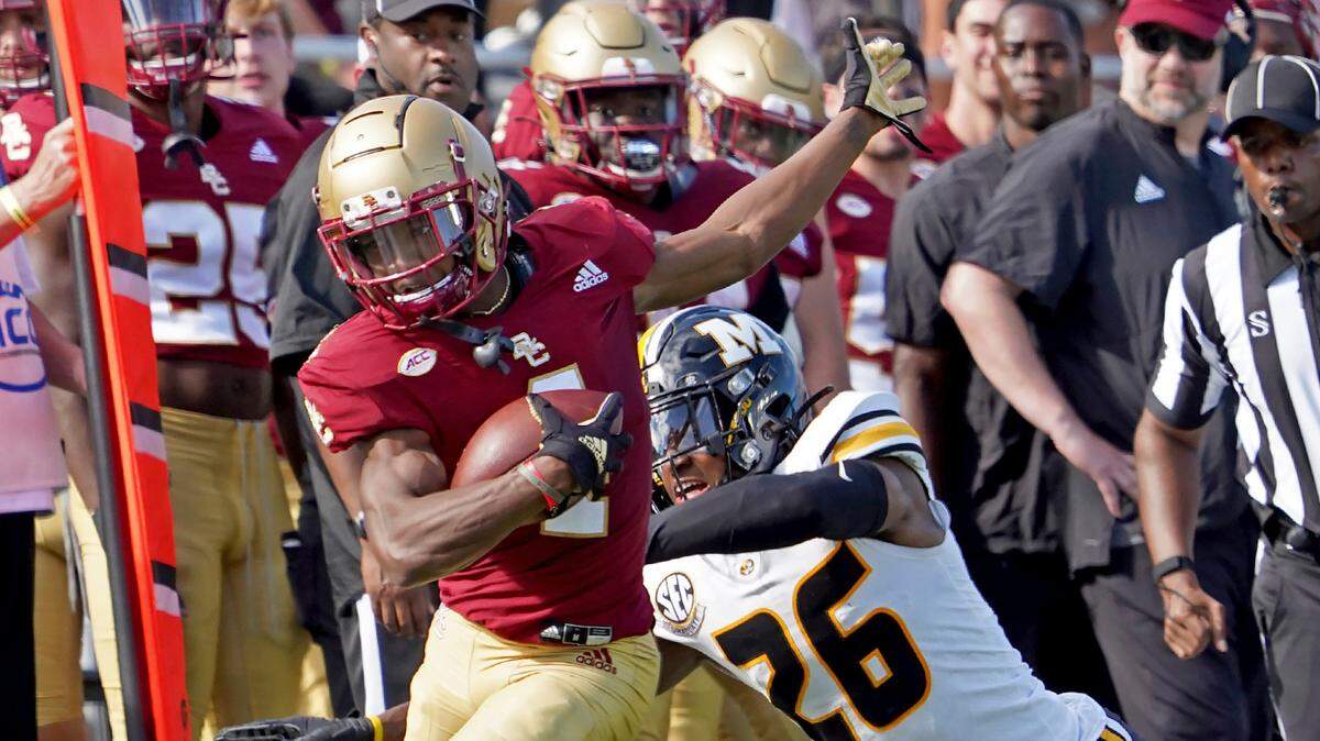 Mizzou cornerback Akaylab Evans, attempting to make a tackle here against a Boston College player, was selected in the fourth round of the 2022 NFL Draft on Saturday by the Minnesota Vikings