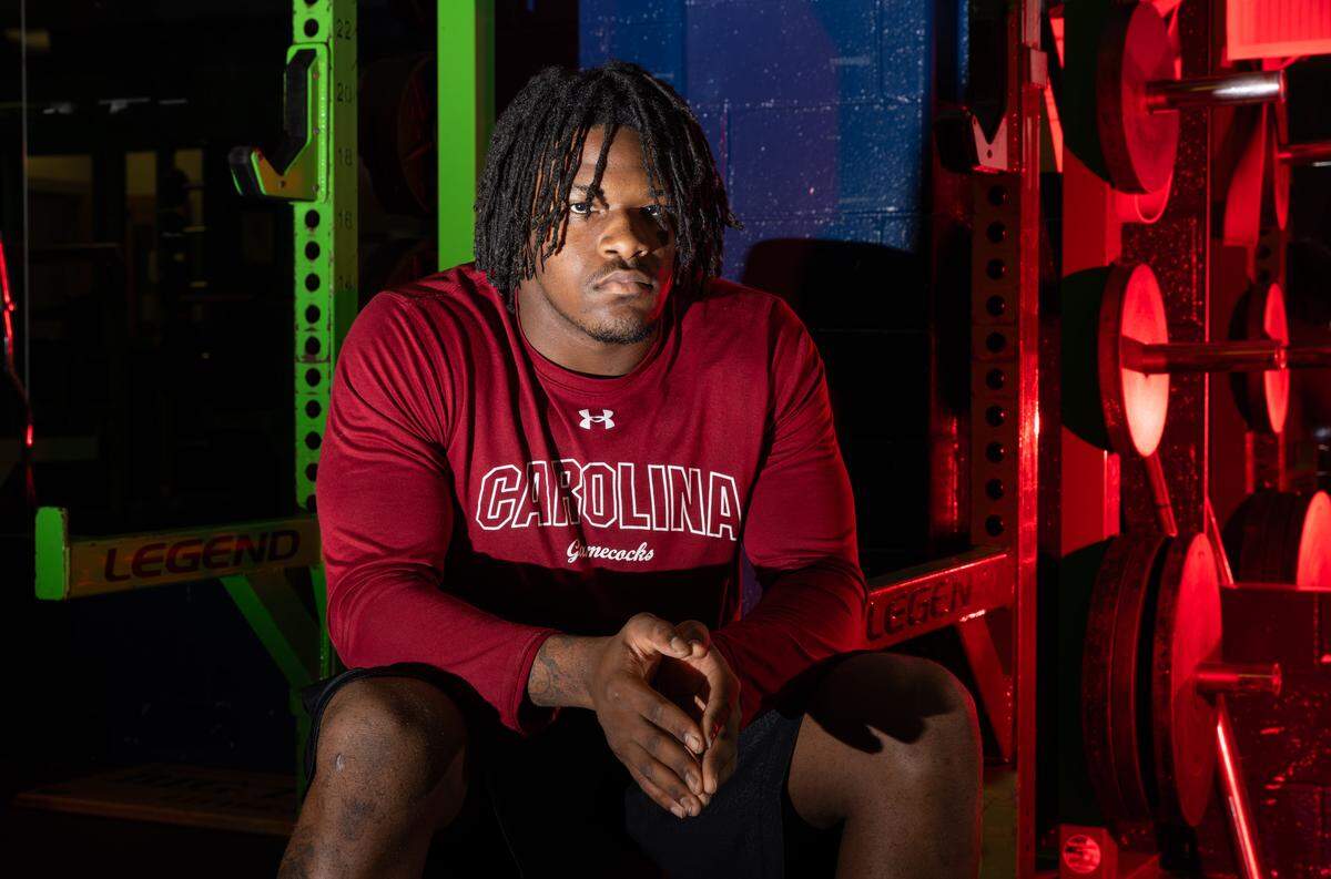 Andrew Harris is seen in the weight room at Weddington High School 