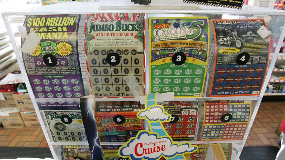 The man was waiting in a long drive-thru when he scratched off his ticket to pass the time, winning the top prize.