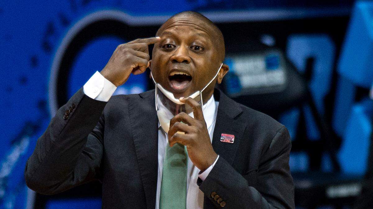 FILE - In this March 19, 2021, file photo, Cleveland State head coach Dennis Gates directs his team during the first half of a first-round game against Houston in the NCAA college basketball tournament at Assembly Hall in Bloomington, Ind. After turning around a program in just two seasons, Gates signed a contract extension Thursday, May 20, 2021, through the 2026-27 season. (AP Photo/Doug McSchooler, File)