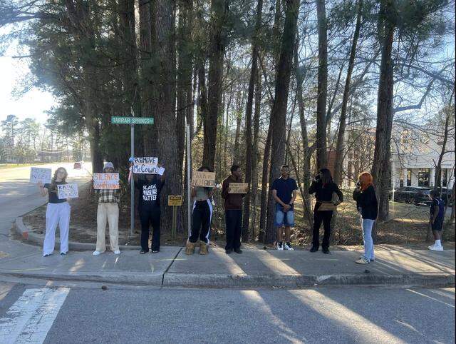 Parents and students protested outside a Lexington 1 school board meeting on March 9, 2026, after a board member criticized a Black History Month fashion show at River Bluff High School.