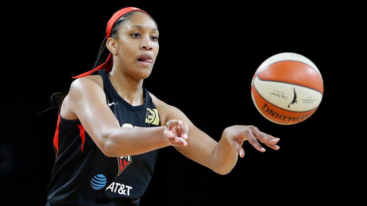 Las Vegas Aces’ A’ja Wilson passes against the Washington Mystics during the first half of Game 4 of a WNBA playoff basketball series Tuesday, Sept. 24, 2019, in Las Vegas.