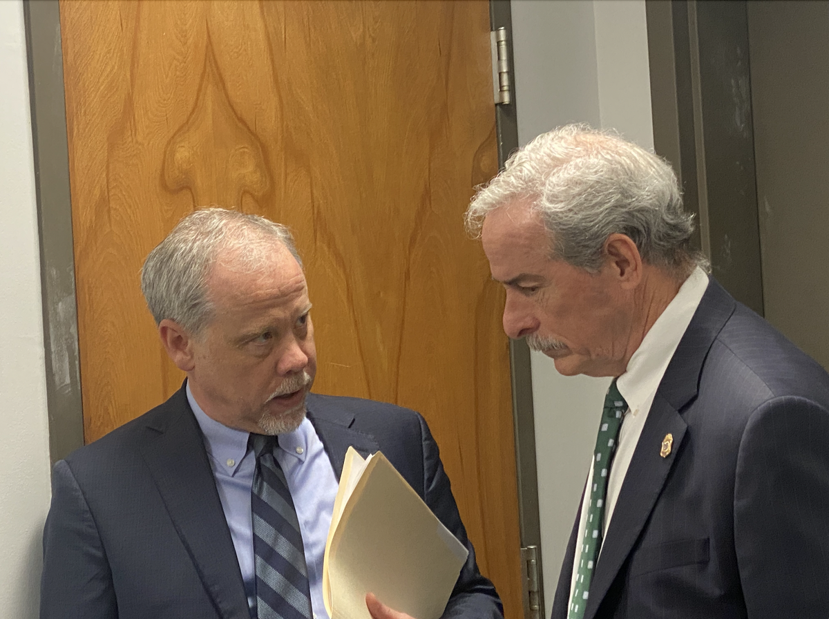 Creighton Waters, an attorney with the S.C. Attorney General’s office, speaks with State Law Enforcement Division Chief Mark Keel on Jan. 12, 2023.