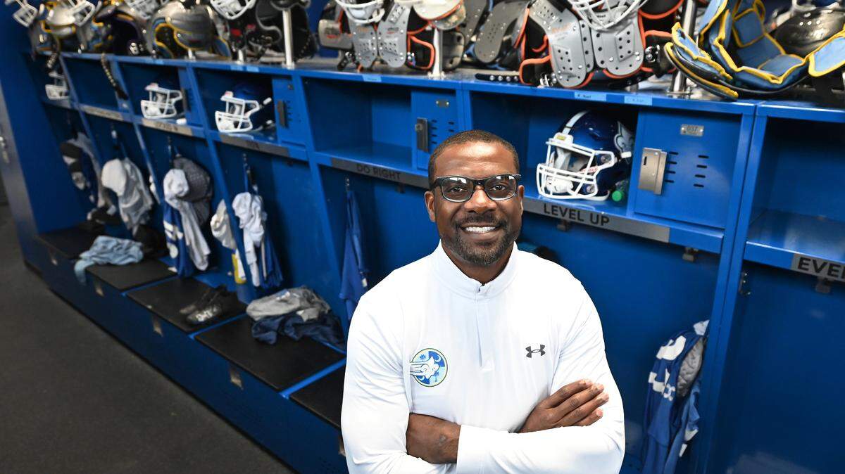 Limestone University football coach and former NFL and Carolina Panthers wide receiver Jerricho Cotchery in February 2025 inside the Limestone locker room. With the surprise closing of the college, Cotchery lost his job in April but would like to stay in the coaching profession.
