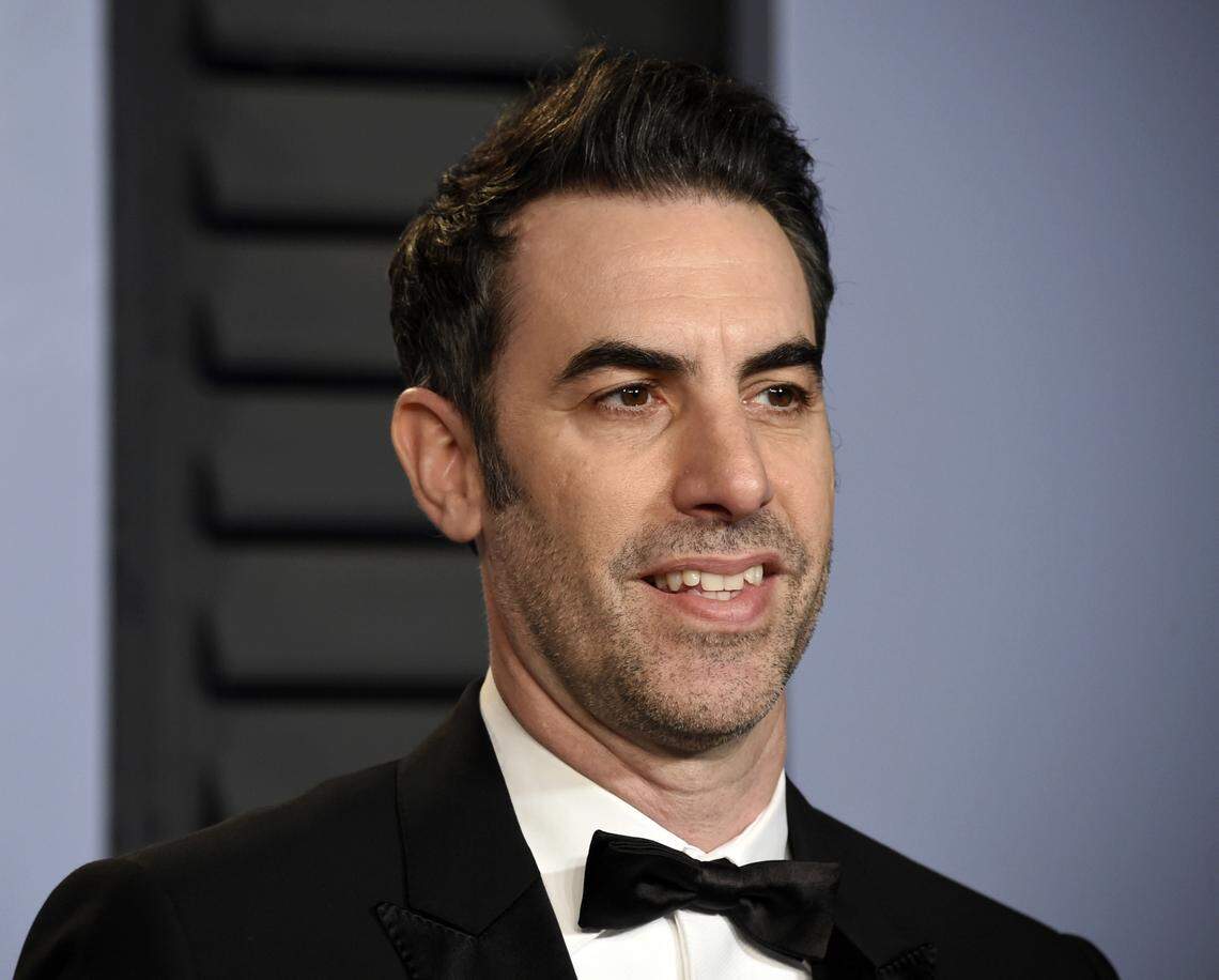 In this March 4, 2018 file photo, Sacha Baron Cohen arrives at the Vanity Fair Oscar Party in Beverly Hills, California. Cohen stars in the new Showtime series “Who Is America?” — premiering Sunday, July 15.