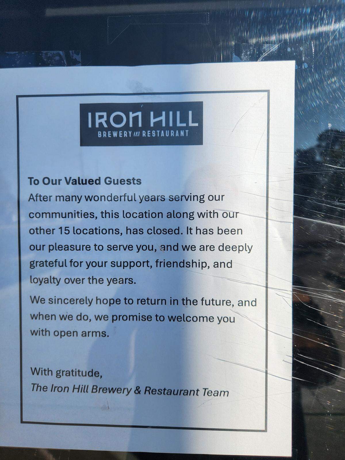 A letter on the door of Iron Hill Brewery on Sabal Street in the BullStreet District in Columbia says that all Iron Hill locations are closed.