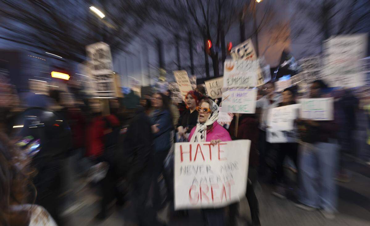 People march down Columbia’s Main Street as part of the call for a nationwide shutdown against ICE, on Friday, Jan. 30, 2026.