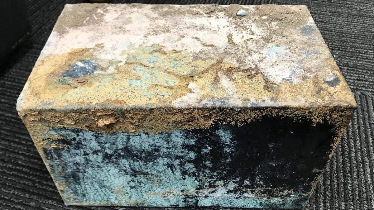 The box, discovered buried at Brookland-Cayce High School, was rusted and soldered shut.