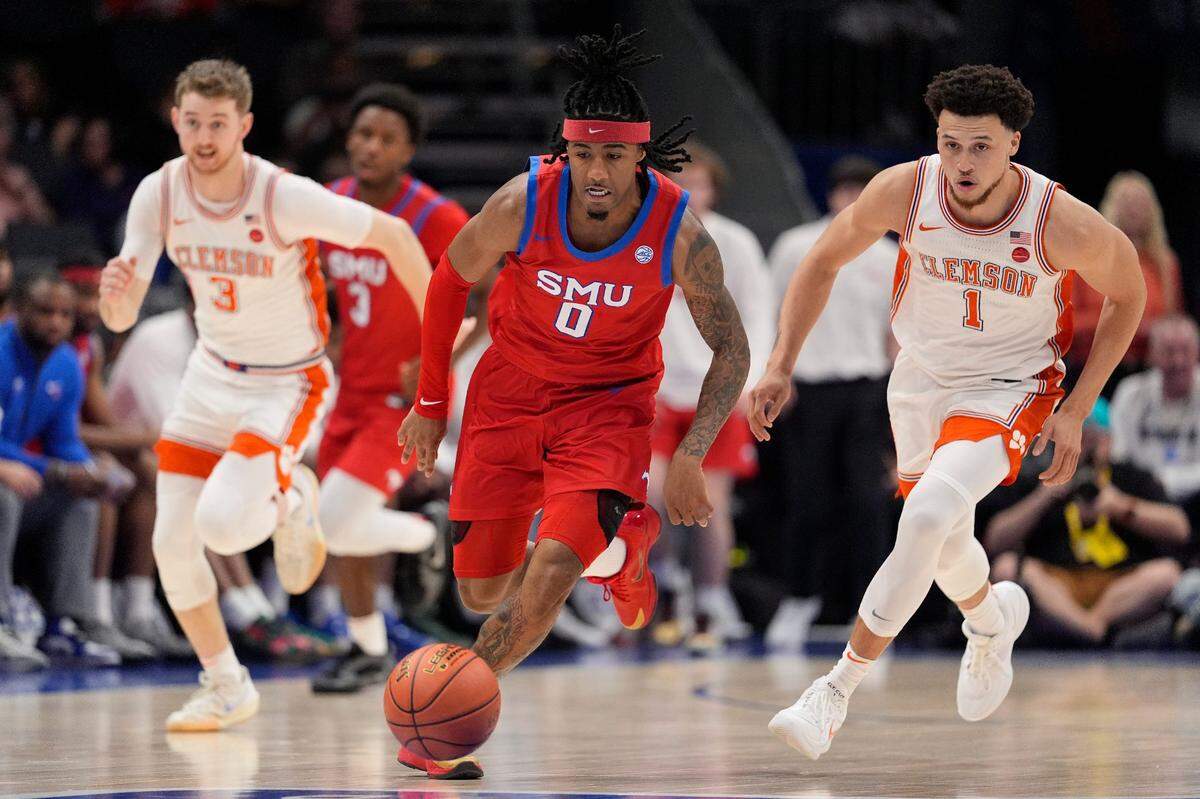 Southern Methodist Mustangs guard B.J. Edwards (0) on a fast break play against the Clemson Tigers during the first half at Spectrum Center.