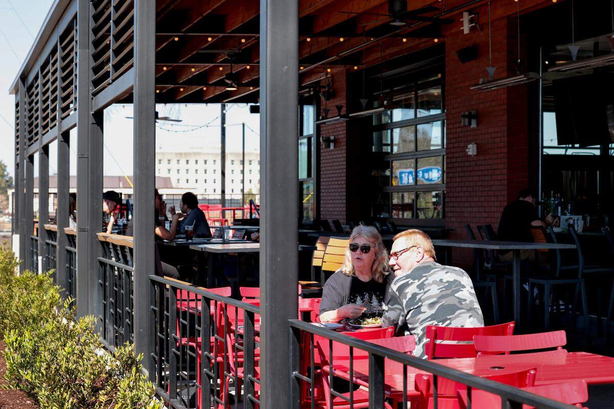 June and Dwayne Moore dine at Iron Hill Brewery & Restaurant in the Bull Street District. The Philly based chain opened in the district in 2023.