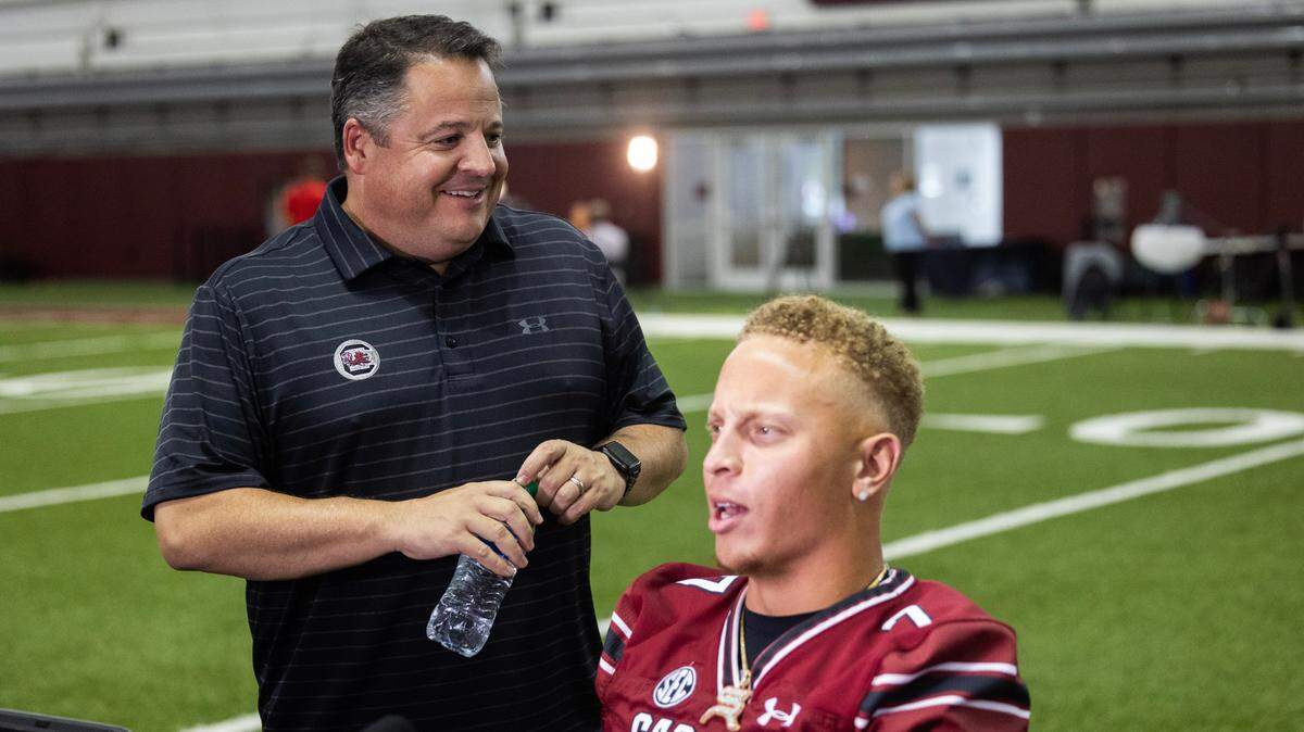 South Carolina’s Spencer Rattler and Dowell Loggains speak to media on Thursday, August 3, 2023.