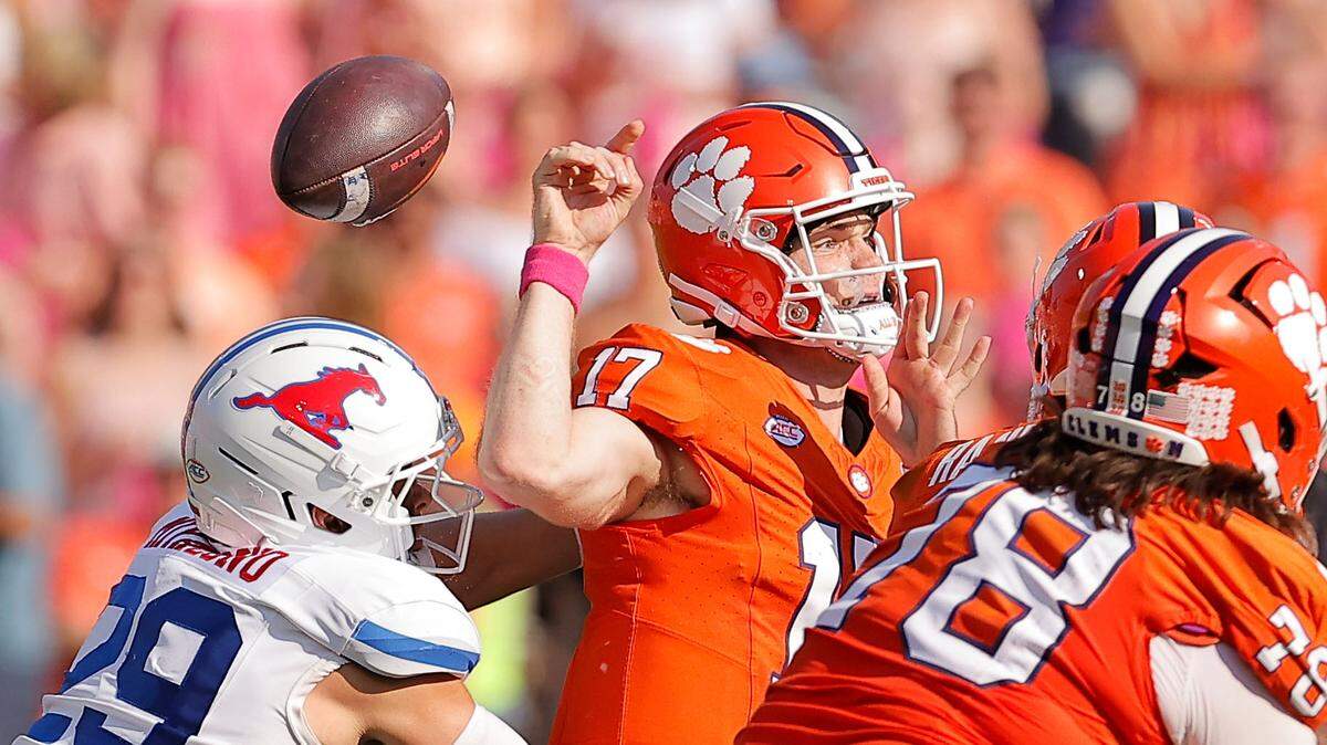 SMU linebacker Brandon Miyazono (29) knocks the ball out of the hands of Clemson quarterback Christopher Vizzina (17) during first-half action in Clemson, S.C on Saturday, Oct. 18, 2025.