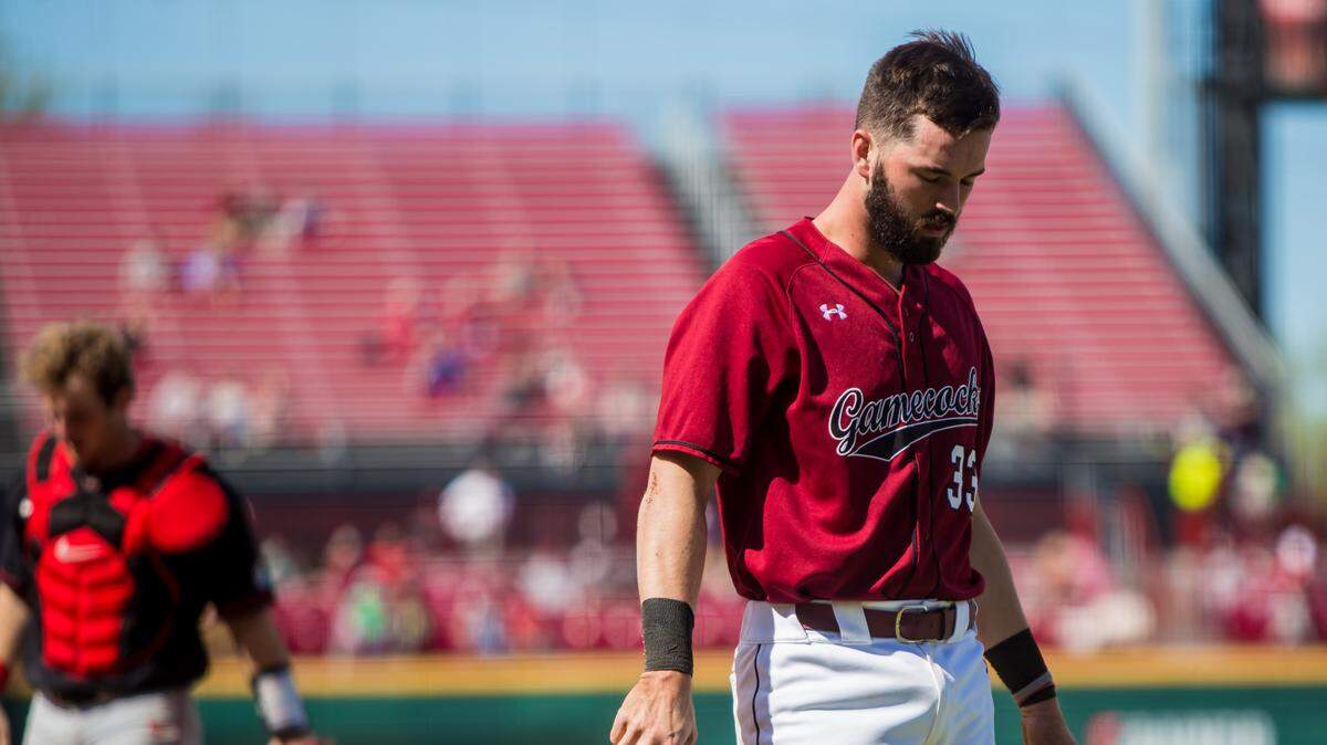 South Carolina Gamecocks catcher Chris Cullen (33) reacts after being tagged out at home on a would-be sacrifice fly against the Georgia Bulldogs.