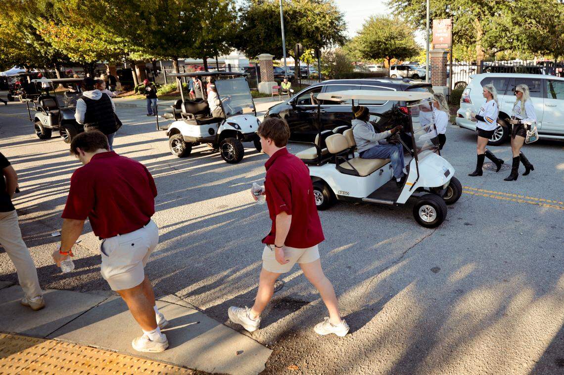 Golf carts buzz around Williams-Brice Stadium and surrounding parking lots before USC’s game against Missouri on Saturday, Nov. 16, 2024