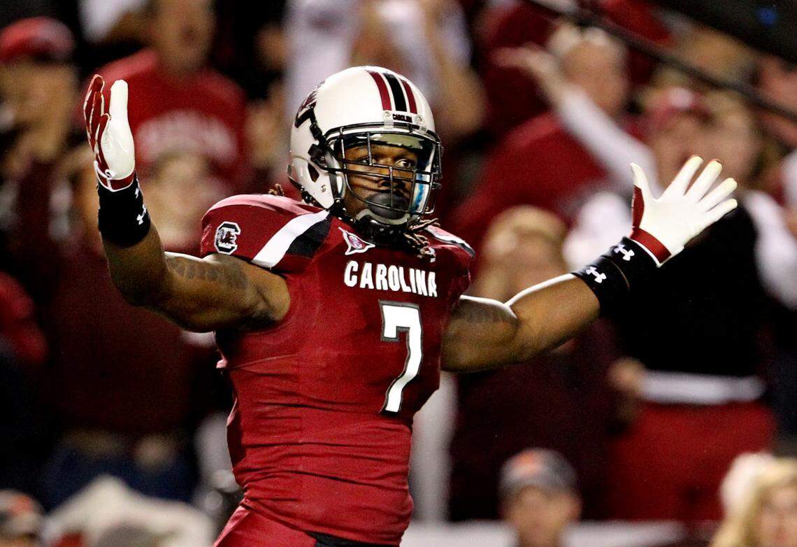 Nov. 26, 2011: Jadeveon Clowney gets pumped after putting pressure on Clemson quarterback Tajh Boyd.
