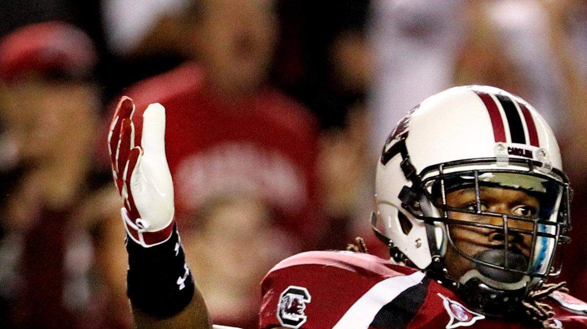 Nov. 26, 2011: Jadeveon Clowney gets pumped after putting pressure on Clemson quarterback Tajh Boyd.