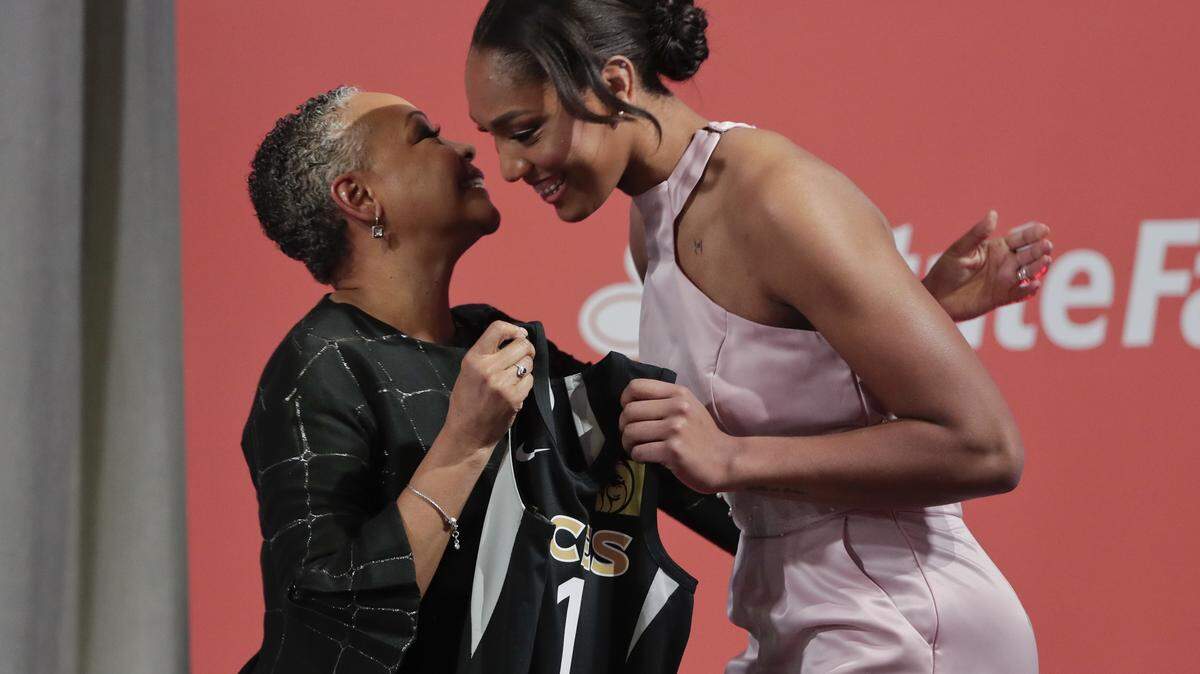 South Carolina's A'ja Wilson, right, is greeted by WNBA president Lisa Borders after being selected as the No. 1 overall pick in the WNBA basketball draft by the Las Vegas Aces, Thursday, April 12, 2018, in New York.