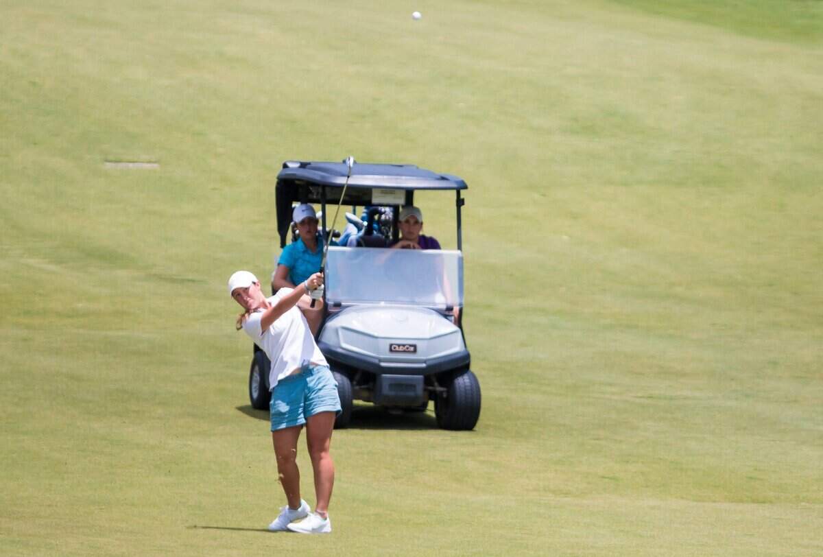 Gracyn Burgess of Lexington hits from the 9th fairway Wednesday during the 2020 WSCGA State Amateur Championship at the Columbia Country Club.