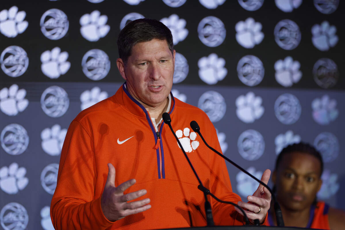 Clemson head coach Brad Brownell (foreground) welcomed F RJ Godfrey (background) back to the Tigers’ roster after a one-year absence.