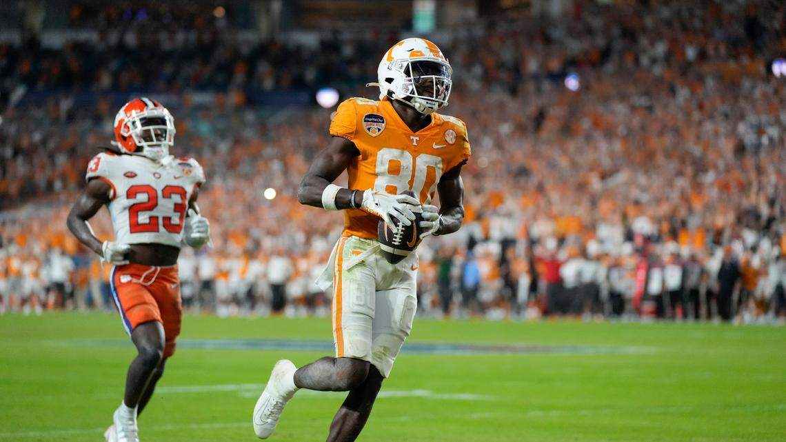 Tennessee wide receiver Ramel Keyton (80) leaves Clemson cornerback Toriano Pride Jr. (23) behind as he scores a touchdown during the second half of the Orange Bowl NCAA college football game Friday, Dec. 30, 2022, in Miami Gardens, Fla. (AP Photo/Rebecca Blackwell)