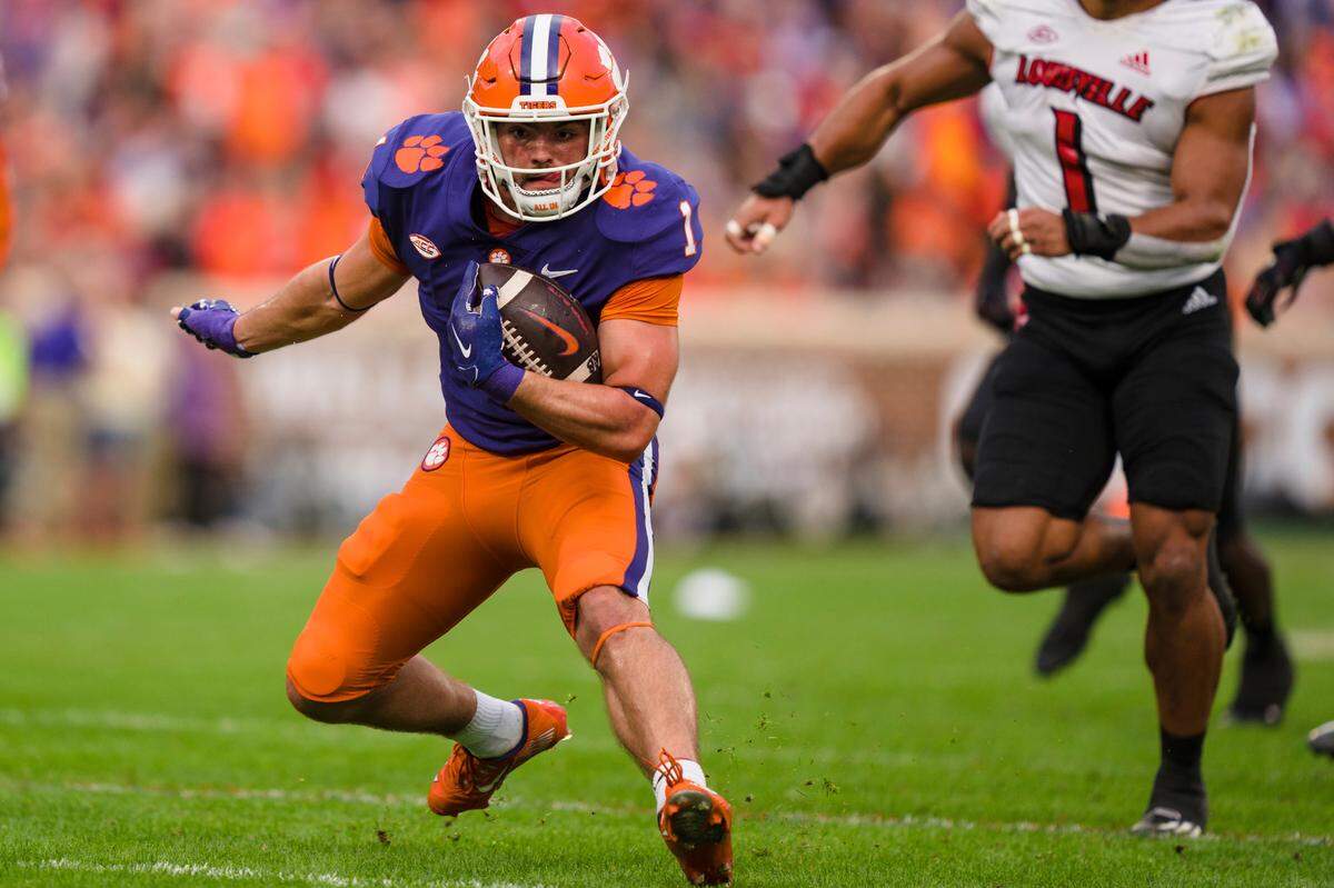 Clemson running back Will Shipley (1) runs with the ball in the first half of an NCAA college football game against Louisville on Saturday, Nov. 12, 2022, in Clemson, S.C. (AP Photo/Jacob Kupferman)