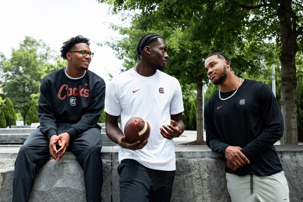 From left, South Carolina QB LaNorris Sellers, WR Nyck Harbor and DE Dylan Stewart are new members of Nike’s Blue Ribbon Elite NIL program