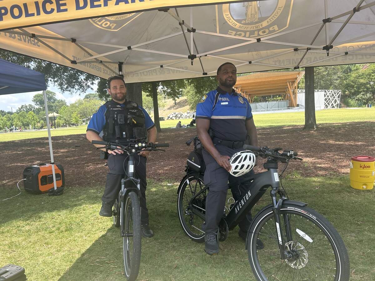 Two officers on e-bikes.