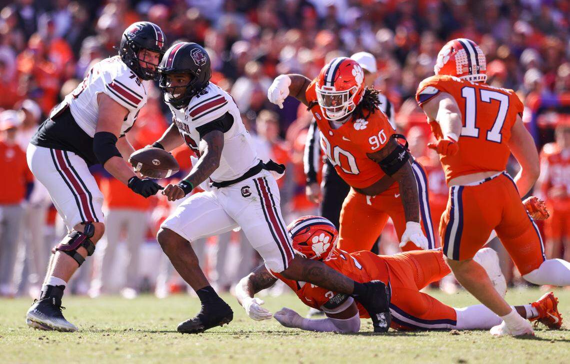 South Carolina quarterback LaNorris Sellers (16) carries the ball during the first half of the Palmetto Bowl between South Carolina and Clemson at Memorial Stadium in Clemson on Saturday, November 30, 2024.