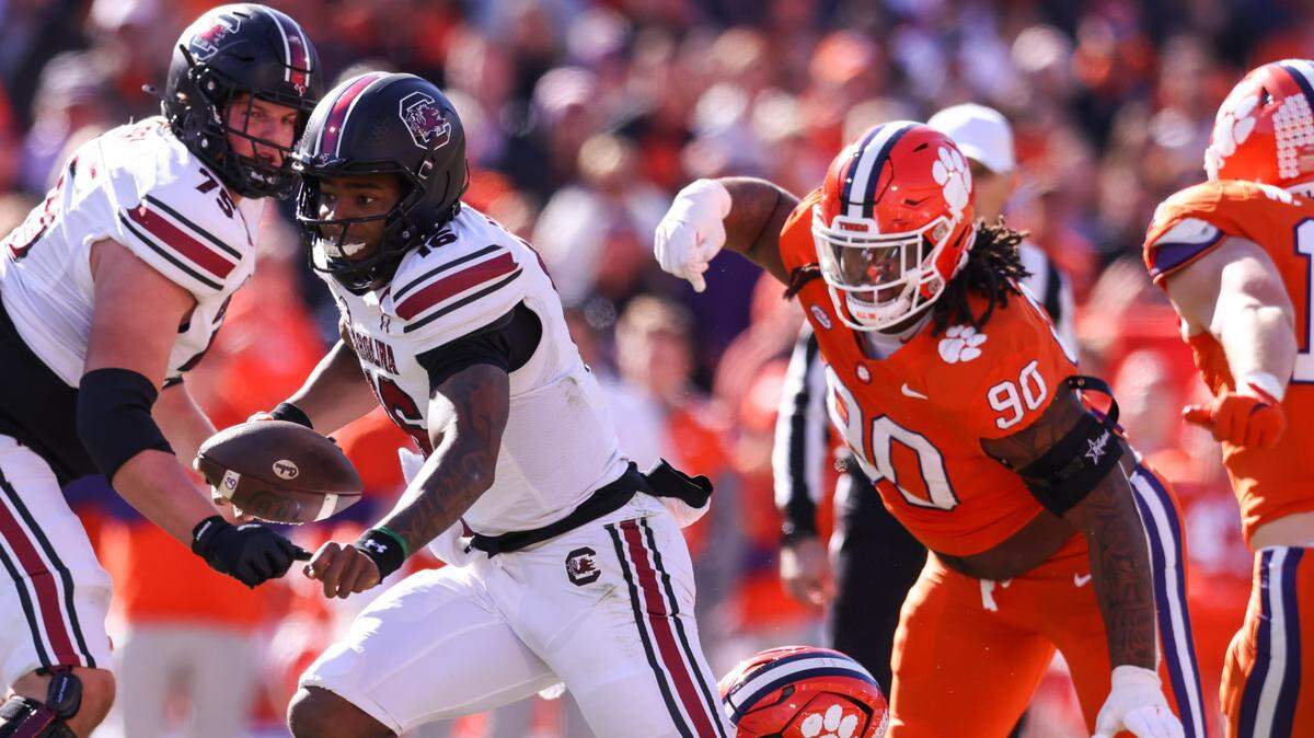 South Carolina quarterback LaNorris Sellers (16) carries the ball during the first half of the Palmetto Bowl between South Carolina and Clemson at Memorial Stadium in Clemson on Saturday, November 30, 2024.